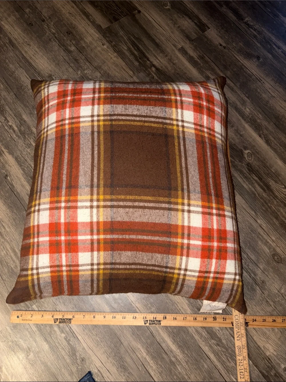 Nido plaid throw